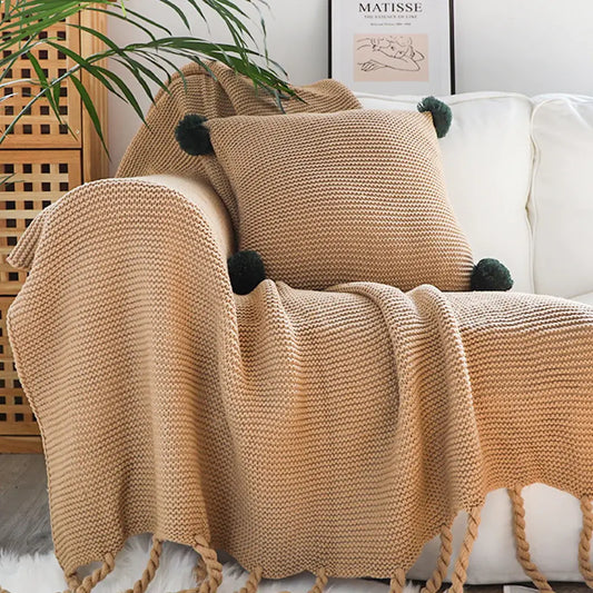 Seasonal Flair: Decorating with Throw Blankets to Capture the Essence of Each Season